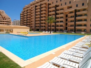 Apartment with 2 bedrooms in Portimao with wonderful sea view shared pool enclosed garden 150 m from the beach